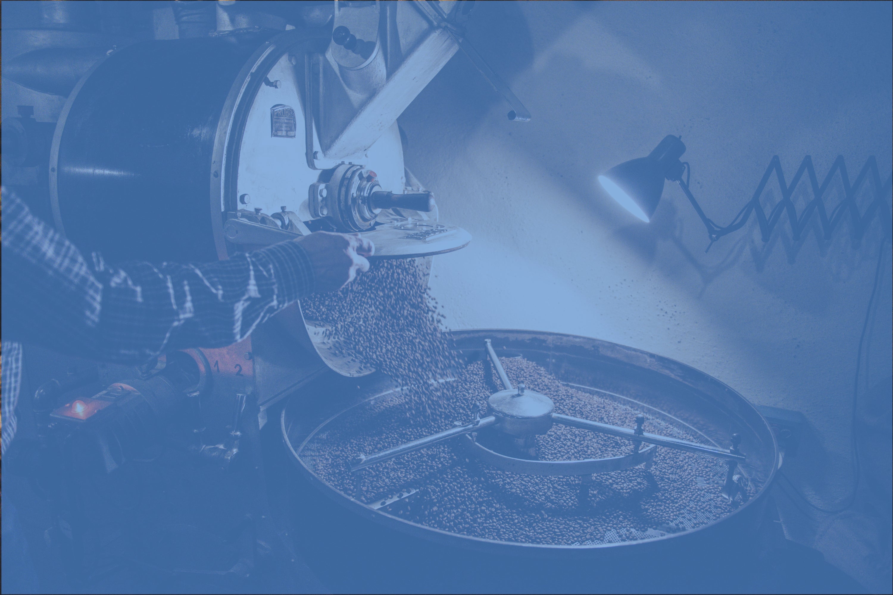 A picture of someone roasting coffee beans for Half-Caff Coffee (half-caffeinated with 50 mg of caffeine) cans.