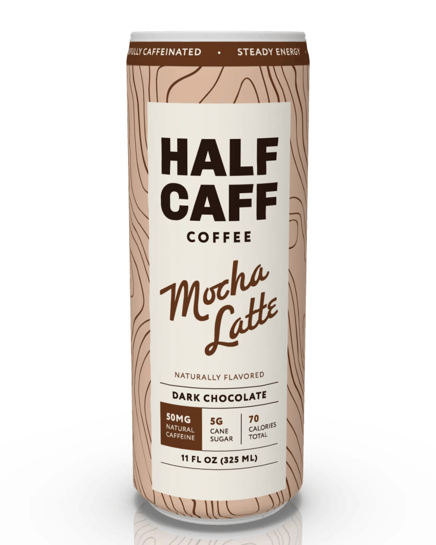 A 11 fl oz can of Half Caffe Coffee Mocha Latte, featuring a cream-colored label with brown wood grain patterns and bold black and brown text, set against a clean white background with a subtle reflection.