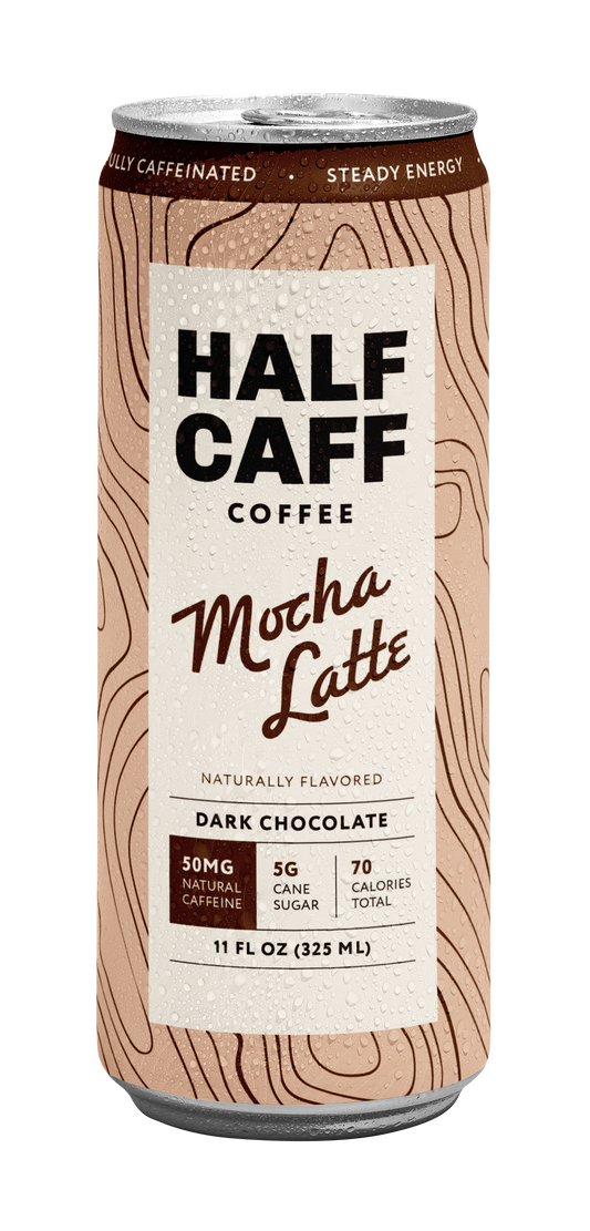 A 11 fl oz can of Half Caff Coffee Mocha Latte, featuring a light brown wood-grain patterned design with a cream-colored label and black text.
